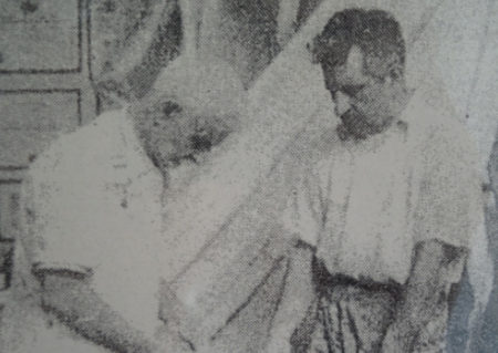 Attilio Contini and his son Victor working together on a mold for Georg Lober’s Hans Christian Anderson.