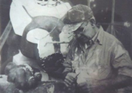 Cesare Contini works on a mold of The Nittany Lion for the University of Pennsylvania.